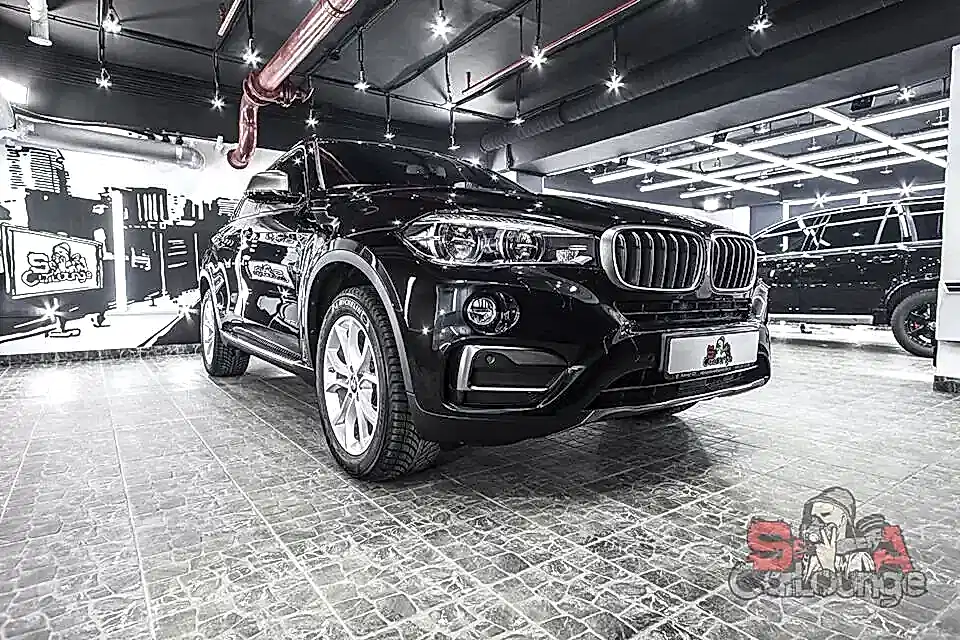 Оклейка зон риска антигравийной пленкой SunTek PPF и керамика кузова BMW X6